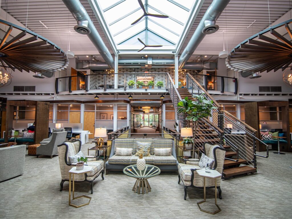 A modern open-plan coworking office space used by growing companies